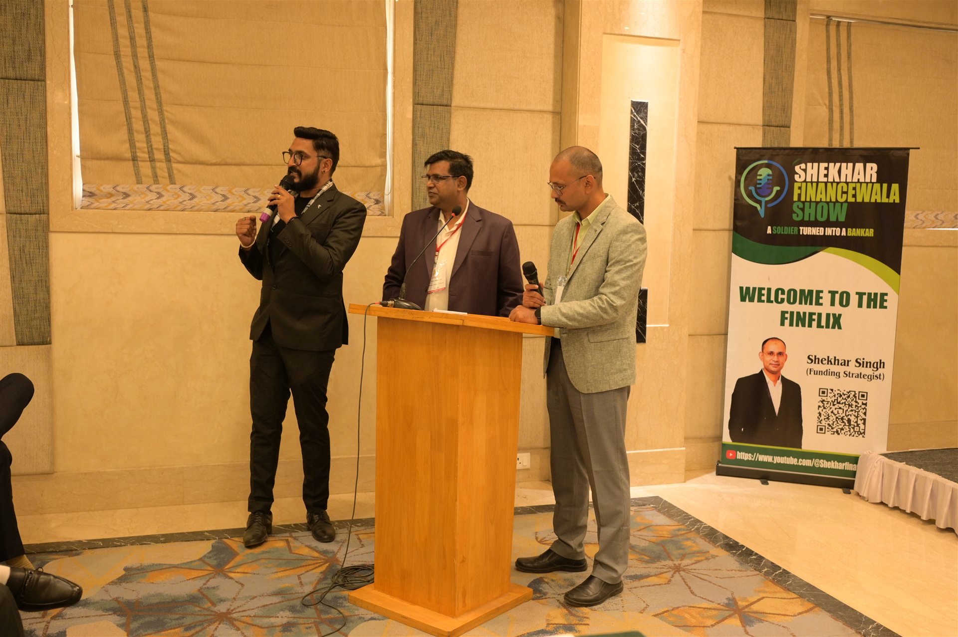A speaker addressing FINMEET guests