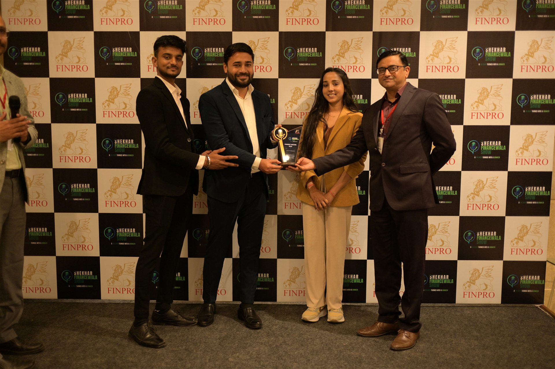 Guests receiving recognition at FINMEET